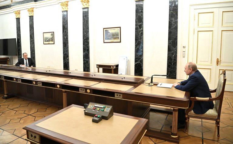 Vladimir Putin and Sergey Lavrov