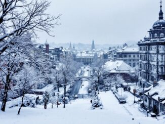 Snowy landscape in the UK with forecast details