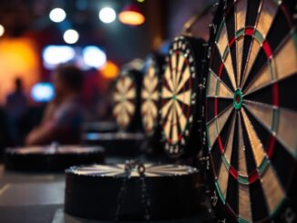 Players competing at the UK Open darts tournament in Minehead